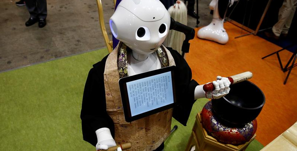 روبوت بديل الكهنة البوذيين في الجنائز 